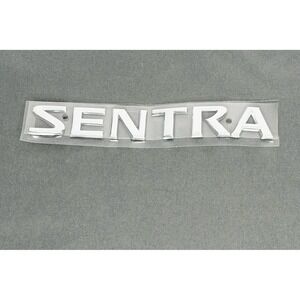 Genuine OEM Nissan Sentra Emblem Nameplate Badge Chrome 848956Z500 NOS